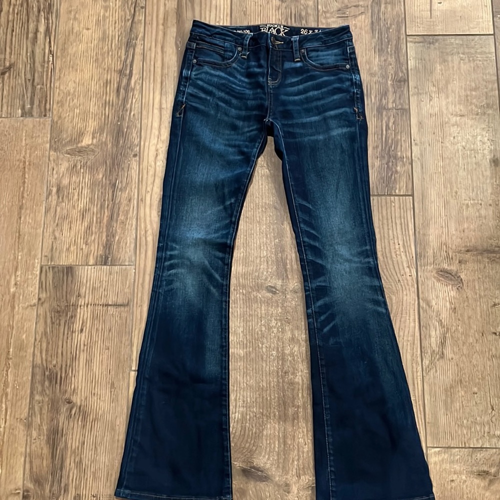 Buckle Black flare jean.